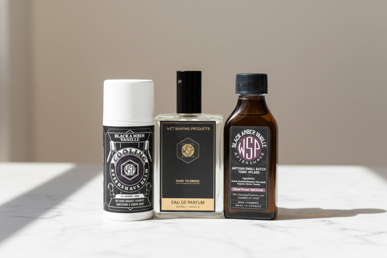 Three bottles of WSP products sitting on a clean, polished white Carrara marble surface with faint grey veining, bright clean morning light from the left, out of focus pale neutral background, premium spa atmosphere, sharp focus on the product.