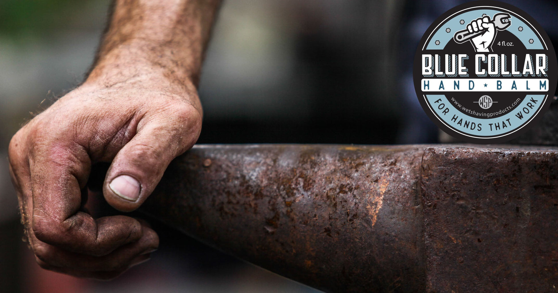 blacksmith leaning on anvil
