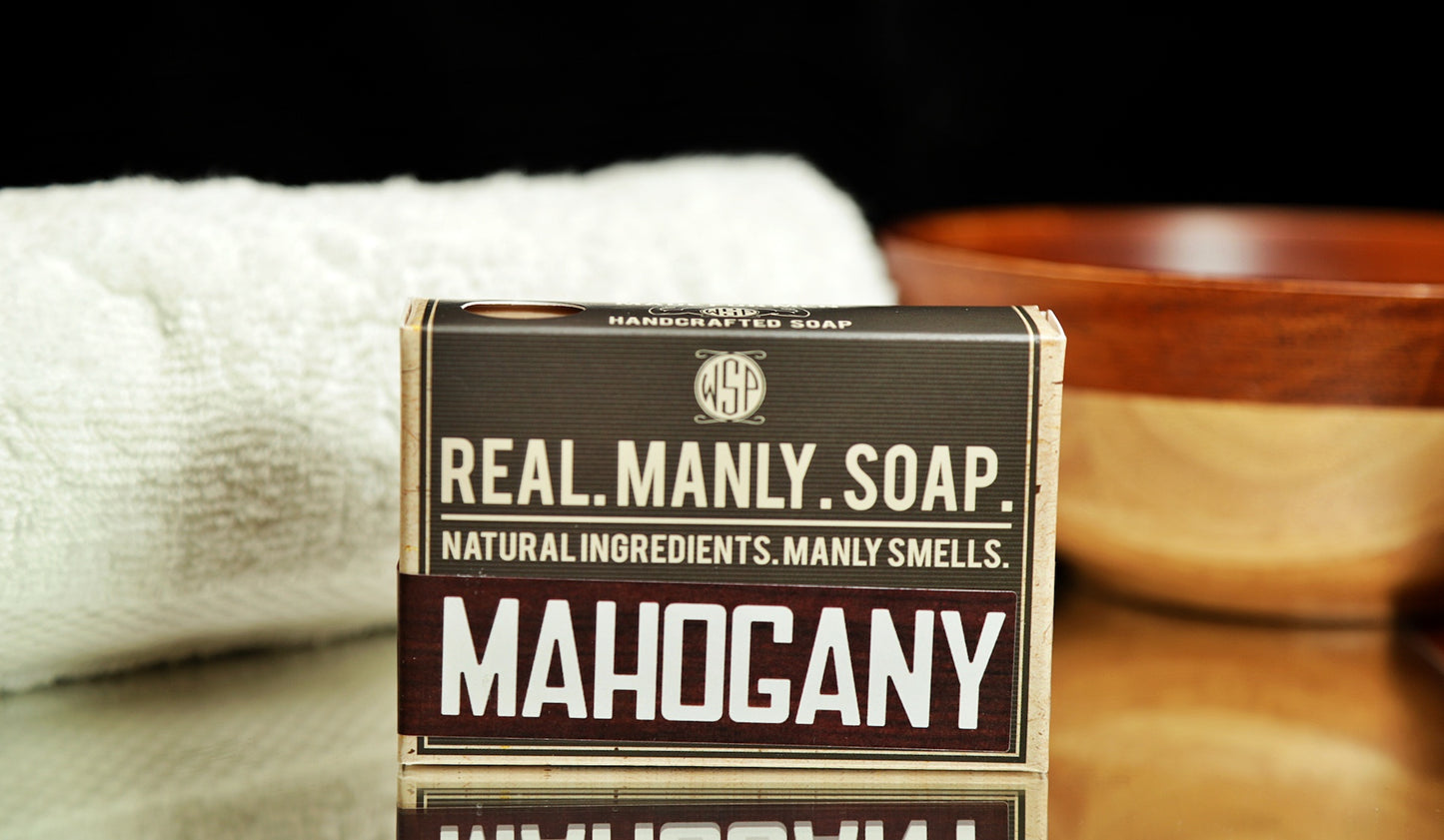 WSP Bar Soap Mahogany scent with a towel and bowl in the background.