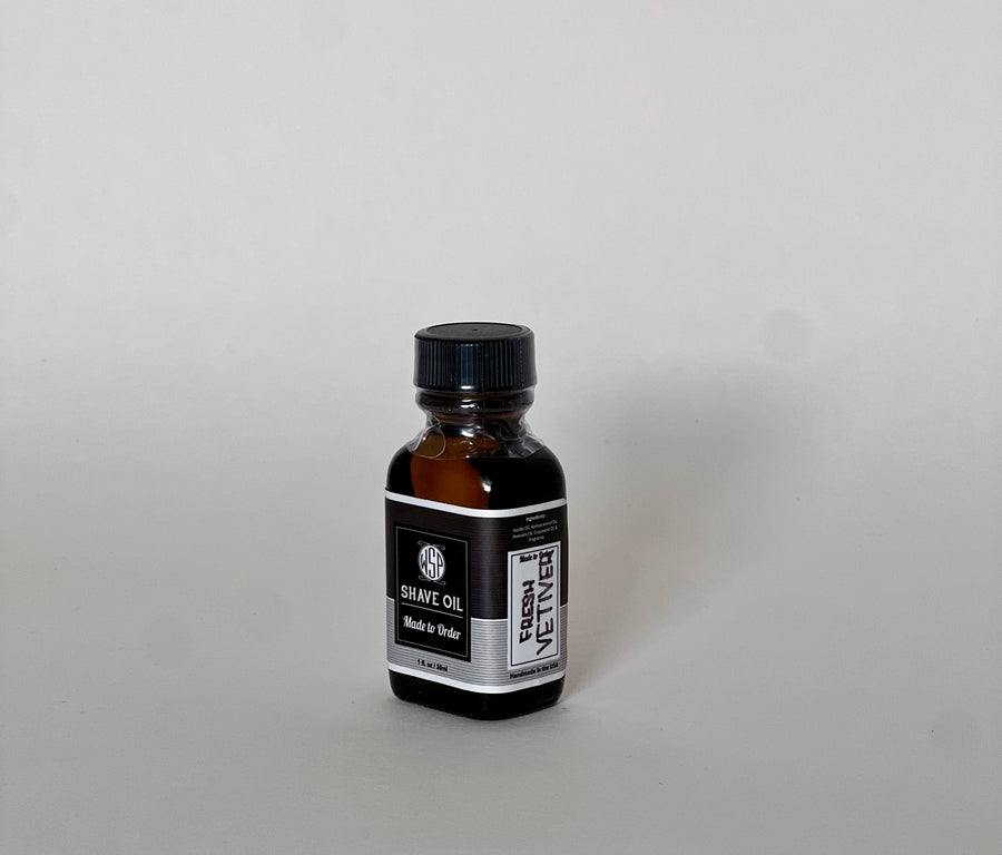 small brown jar of made to order shave oil