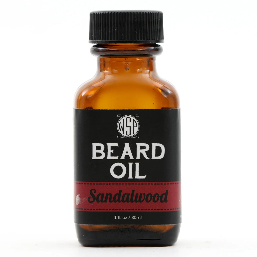 Wet Shaving Products' 1 fl oz amber bottle of Sandalwood-scented vegan beard oil, a natural beard conditioner for clean beard care.