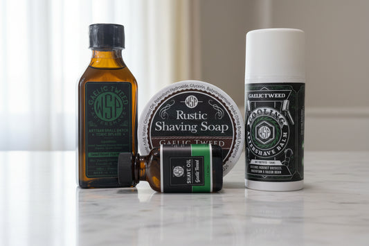 Collection of Rustic Tweed grooming products on a surface with a blurred background.