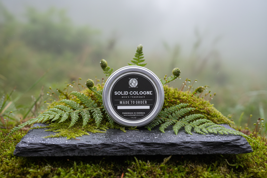 Resting on a dark grey slate tile surface, surrounded by fresh green moss and fern fronds, misty morning light, dew drops on the surface, natural environment background, soft focus, high definition nature photography.