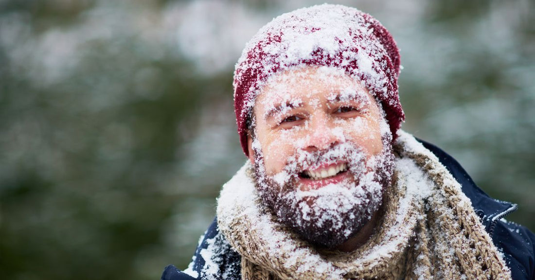 Bearded man outdoors in winter showing well-groomed beard.