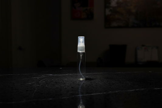 Small electronic device on a dark floor with a blurred background