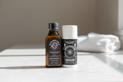Two bottles of WSA (Wet Shaving Association) grooming products on a white background