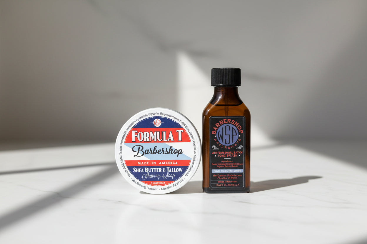Bottle of Formula T Barbershop soap on a tiled bathroom counter