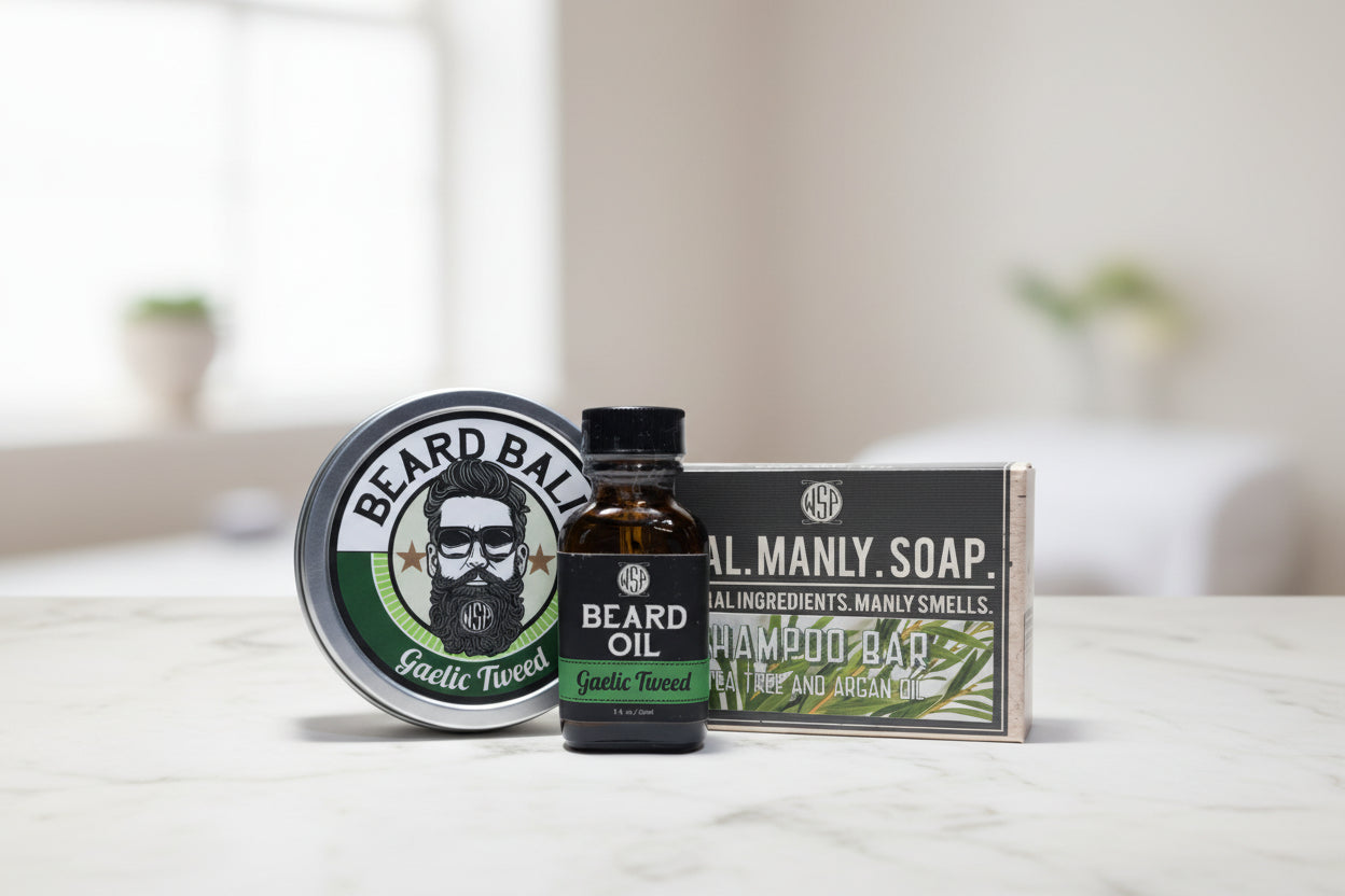 gaelic tweed beard oil, beard balm, and shampoo bar set on marble countertop