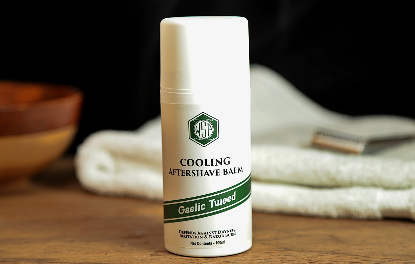 Small white bottle on table WSP Cooling Aftershave Balm in Gaelic Tweed scent