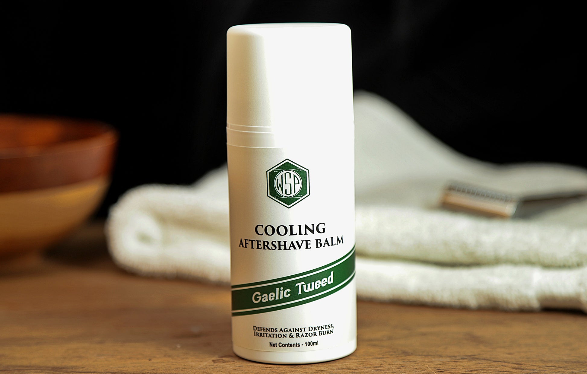 Small white bottle on table WSP Cooling Aftershave Balm in Gaelic Tweed scent