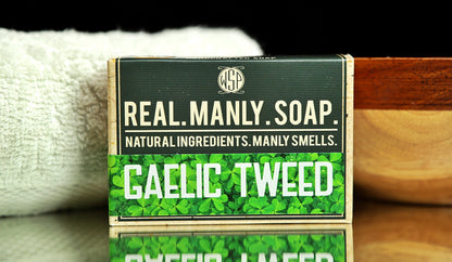 WSP Bar Soap Gaelic Tweed scent with a towel and bowl in the background.