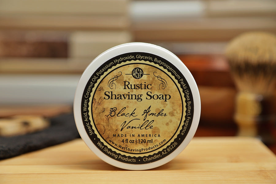 WSP small round container on table Black Amber Vanilla Shaving Soap