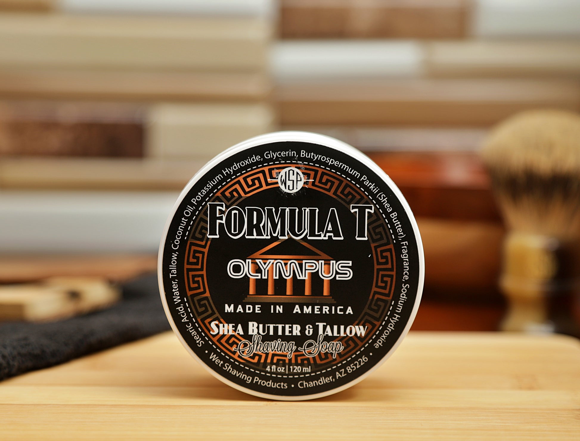 WSP small round container on table Olympus Formula T Shaving Soap