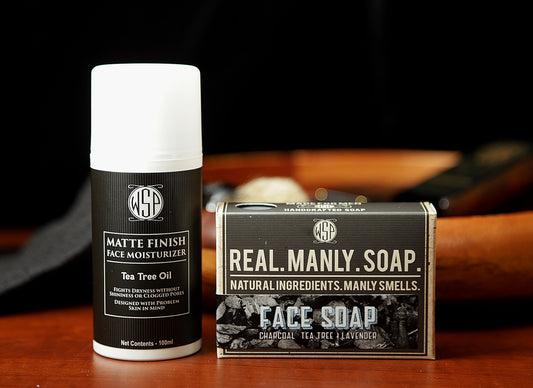 Box of tea Tree face soap and bottle of Tea Tree Oil Face moisturizer