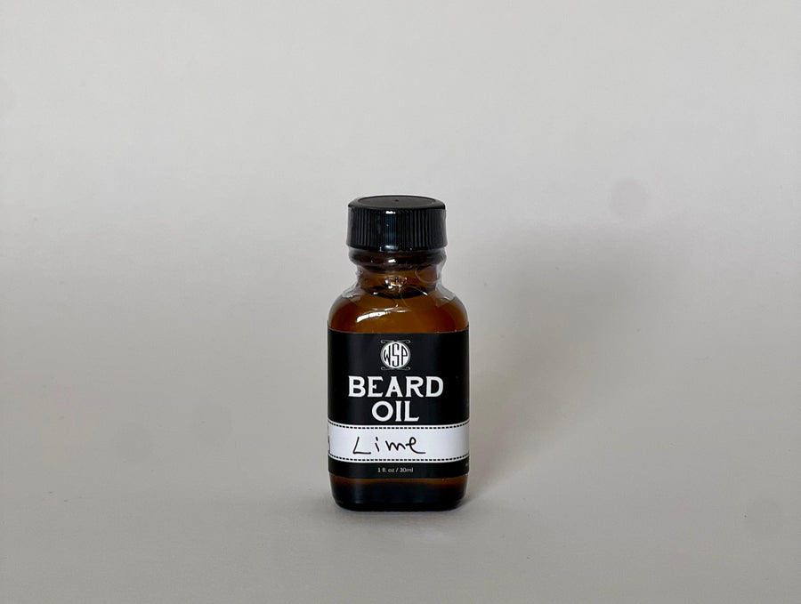 small brown jar of lime beard oil