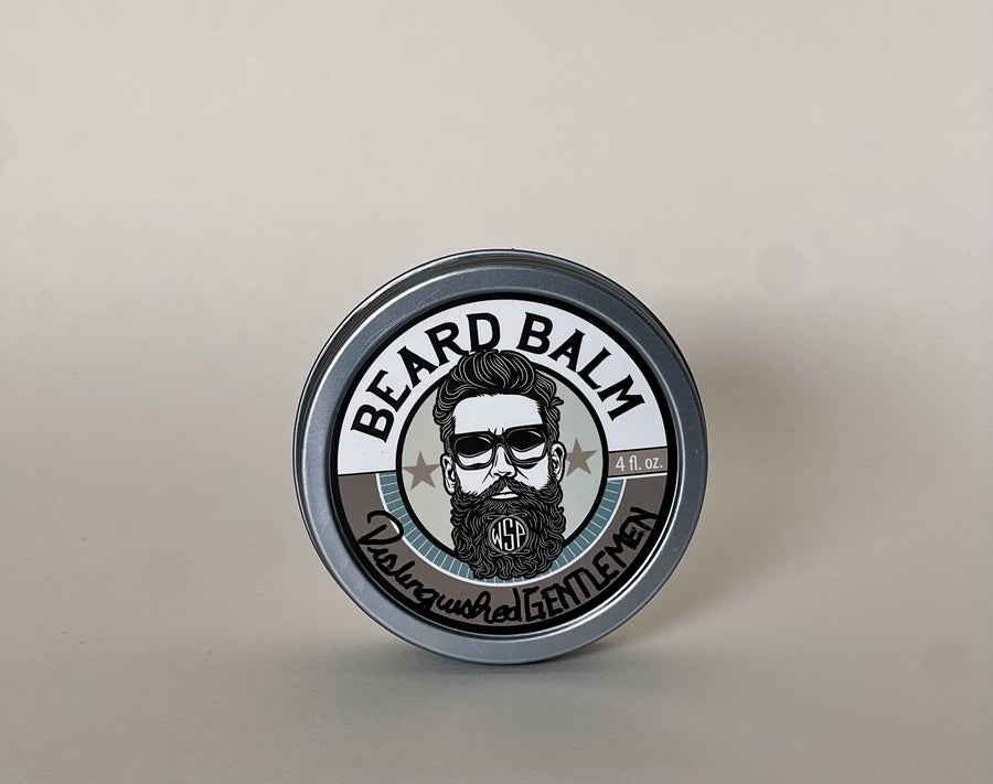 small round container of beard balm