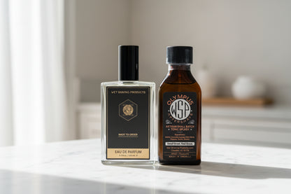 Two bottles of Wet Shaving Products on a marble counter