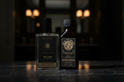 Two bottles of Wet Shaving Products on a dark background