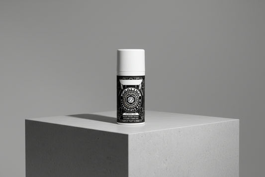 WSP Aftershave Balm with a geometric label on a textured wall.