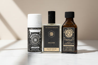 Three bottles of grooming products with labels on a white background