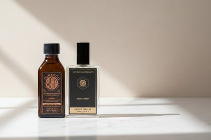 Two bottles of Wet Shaving Products on a white background. EdP Spray & Aftershave Splash. Tobacco Scent