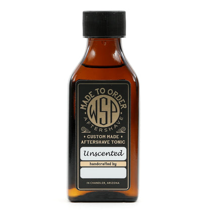 Small brown bottle of Unscented Aftershave Tonic