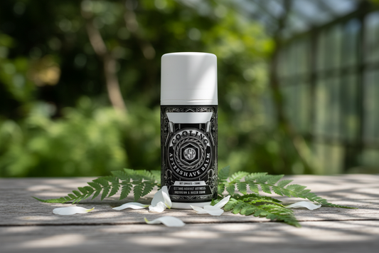 Deodorant stick on a wooden surface with greenery in the background