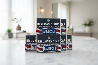 Real Manly Soap packaging with 'Barbershop' scent on a marble surface.