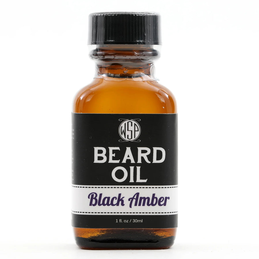 Wet Shaving Products' 1 fl oz amber bottle of Black Amber-scented vegan beard oil, a natural beard conditioner for clean beard care.
