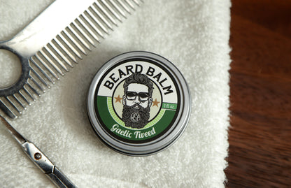 WSP Beard Balm Gaelic Tweed on towel with scissors and comb