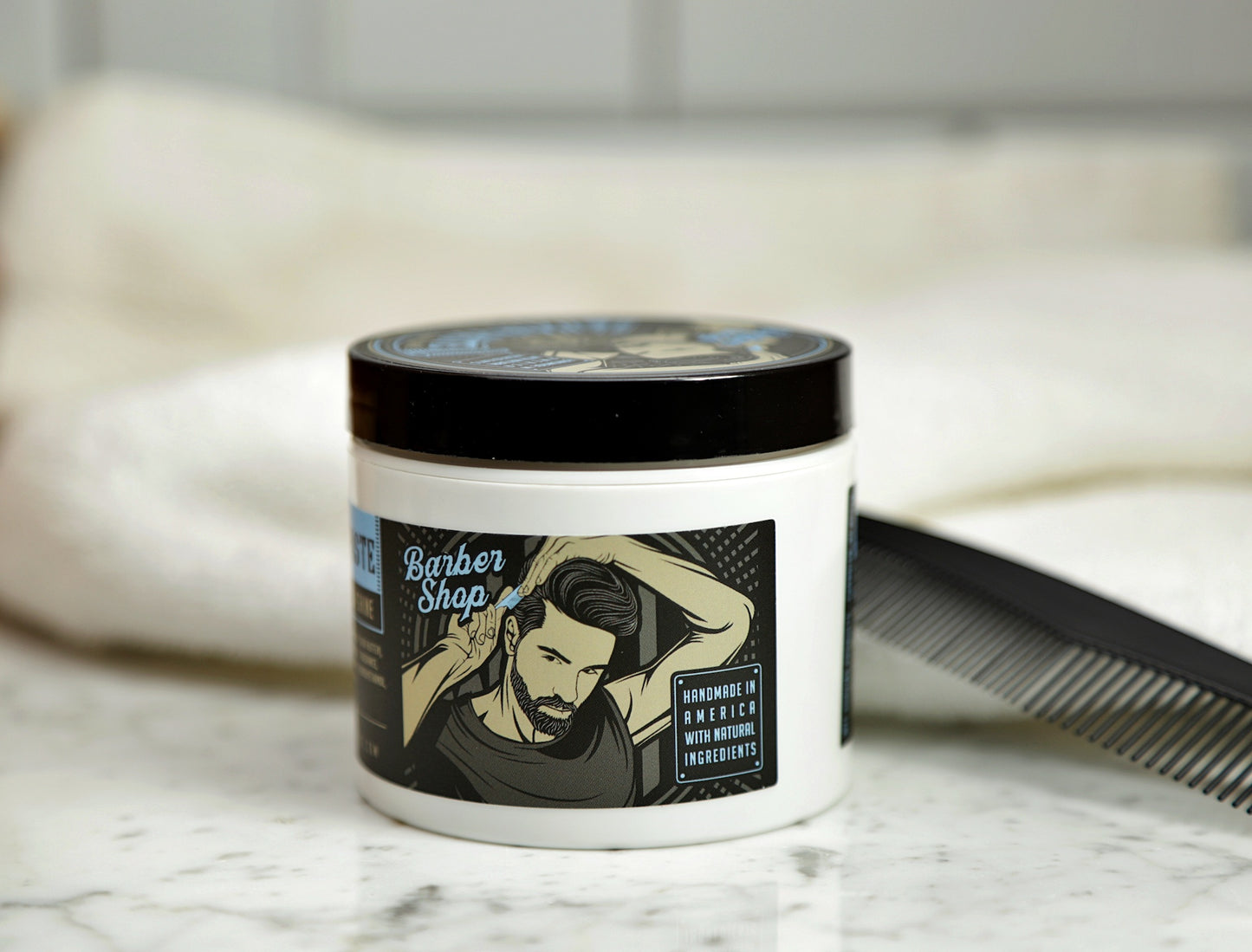 Front view of hair paste tub in Barbershop Scent.