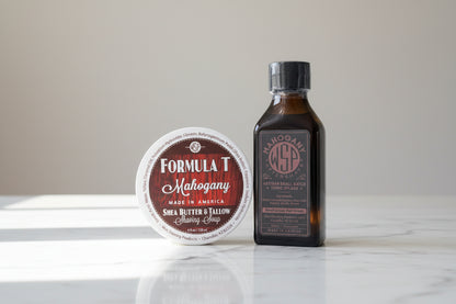 Formula T Mahogany shaving soap and bottle on a kitchen counter