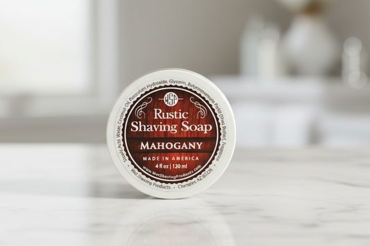 Rustic Shaving Soap container on a marble surface with a blurred background
