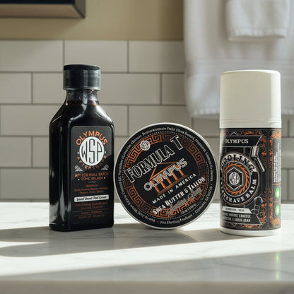 Three grooming products from Olympus on a wooden surface with a blurred background