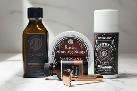 Collection of Mahogany brand shaving products on a bathroom counter.