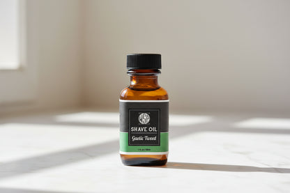 Bottle of shave oil with a black and green label on a white background