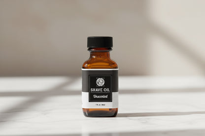 Bottle of WSP Unscented Shave Oil on a white background