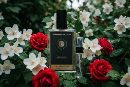 Lush, blooming white jasmine flowers and deep red roses covered in morning dew droplets, representing the vibrant Flora & Bloom botanical collection.