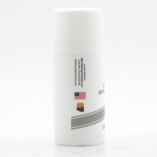 small white bottle of aftershave balm