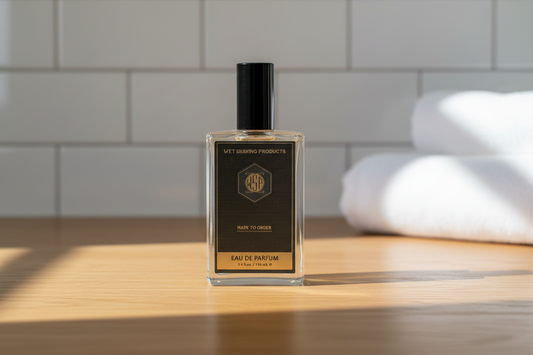wsp cologne bottle resting on a clean, warm oak wooden bathroom counter, bright natural morning light streaming from the side, out of focus background of classic white subway tiles and a folded white cotton towel, clean, timeless, masculine grooming atmosphere, photorealistic, sharp focus on the product.