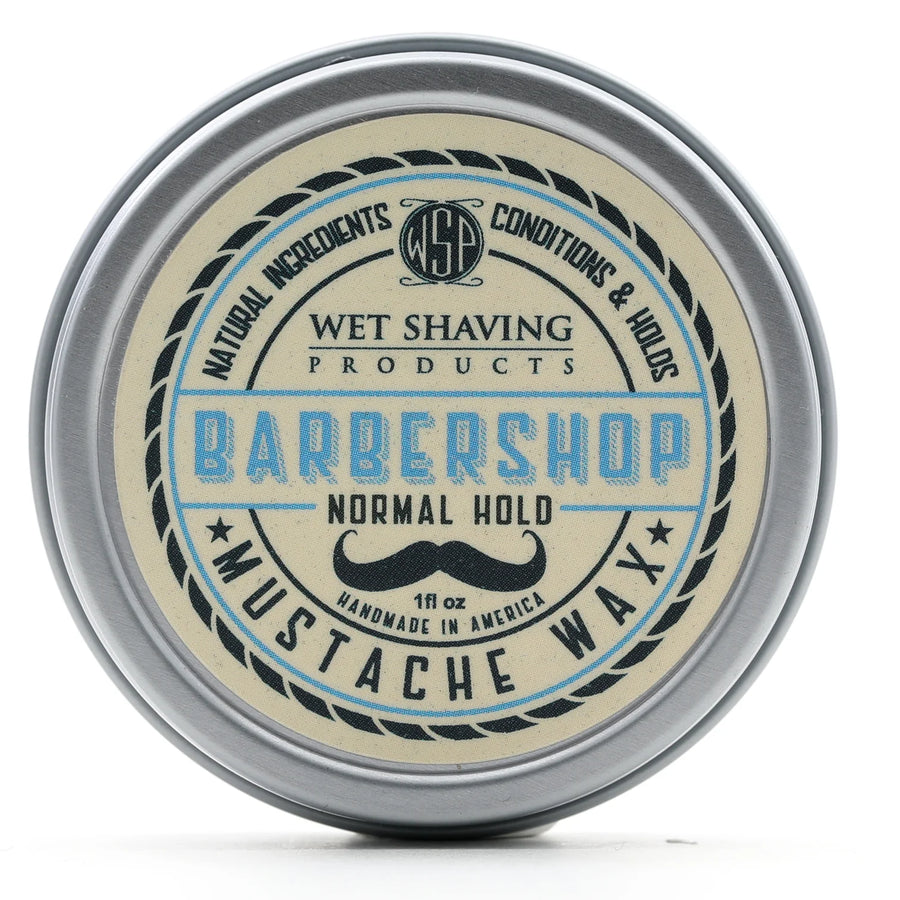 Front view of Normal Hold Mustache Wax tin with 'Barbershop' fragrance label.