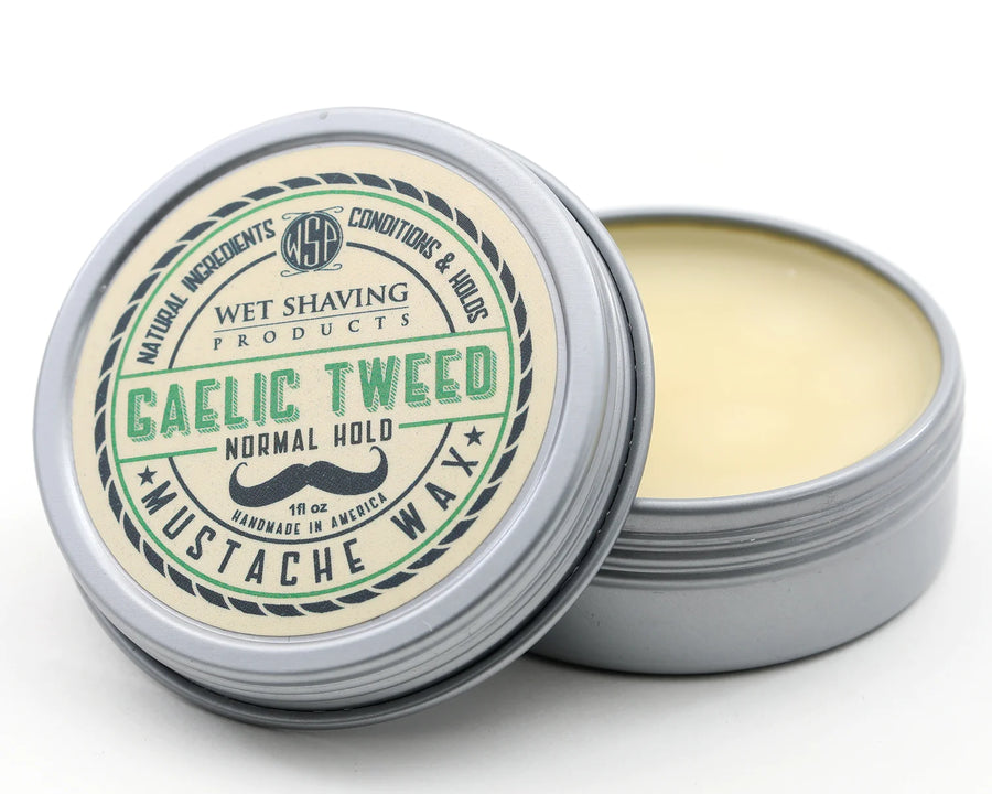Open Normal Hold Mustache Wax tin with 'Gaelic Tweed' scent, lid leaning against the base.