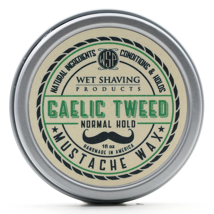 Front view of Normal Hold Mustache Wax tin with 'Gaelic Tweed' fragrance label.